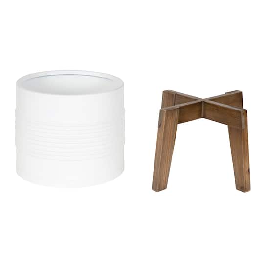 Kate and Laurel 7ft. Oliveira Faux Olive Tree in Rustic Brown Footed Planter